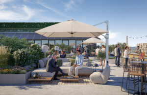 Auf der großzügigen Dachterrasse von The Verse verbinden sich urbanes Arbeiten und entspannte Atmosphäre – mit einzigartigem Blick über München.© rendart Architekturvisualisierungen