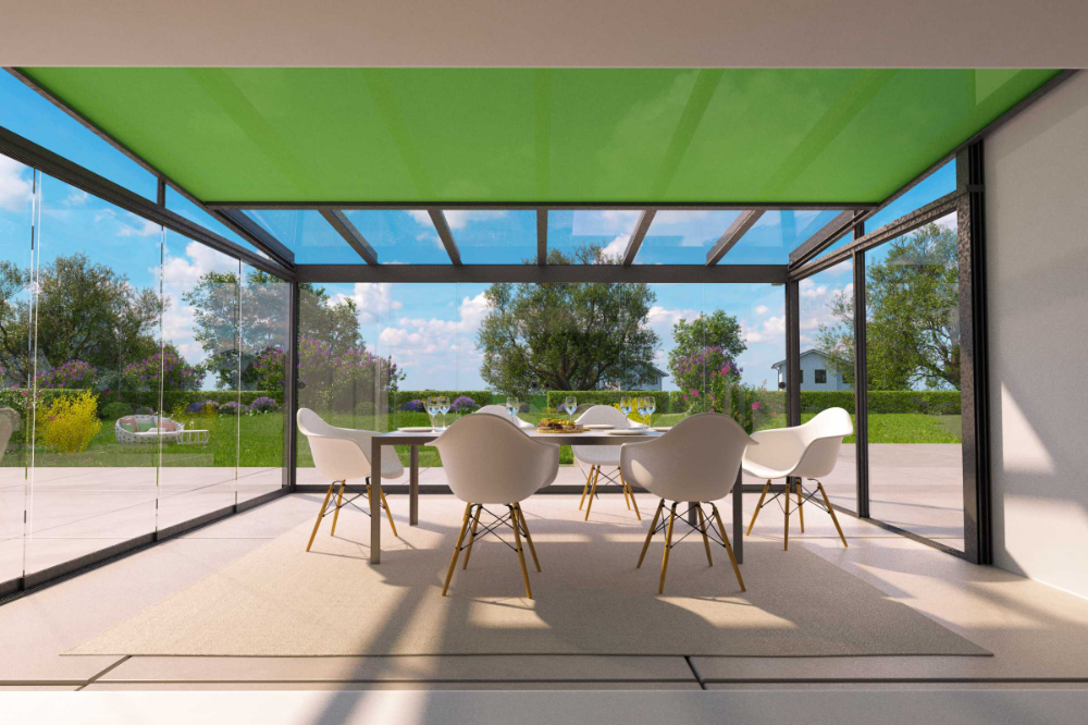 © TS-Aluminium-Profilsysteme GmbH & Co. KG Beschattete Terasse mit grüner Dachmarkise